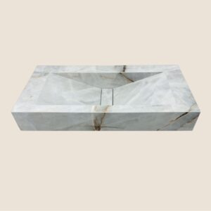 Lavabo en piedra sinterizada modelo Isara fabricado a medida para baños modernos y personalizados