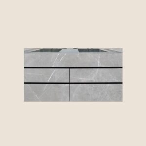Mueble de baño en piedra sinterizada modelo Oceara fabricado a medida con acabado personalizable